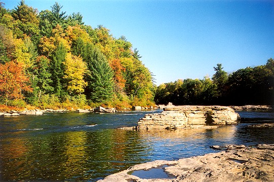 Large River Rocks With Ferncliff Peninsula Picture
