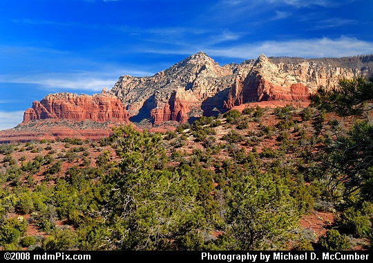 Some Red Buttes before a Pinnacle of White Rock Picture